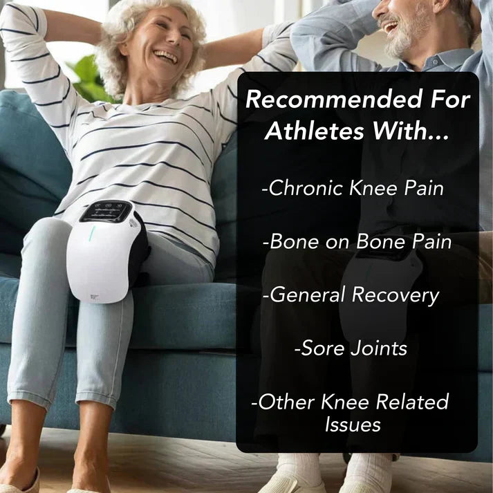 User wearing red light knee massager while relaxing for at-home muscle and joint comfort